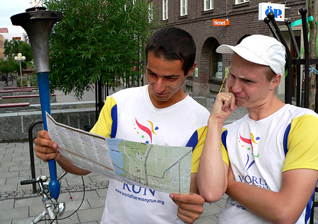 Sandro Zincarini studies a map during the World Harmony Run