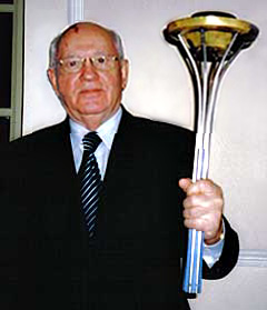 President Mikhail Gorbachev holds the World Harmony Run torch
