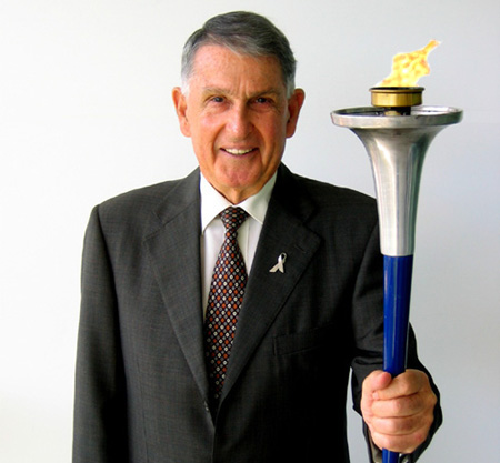 Ron Clarke holds World Harmony Run torch – 2008