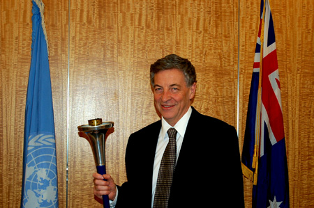 Robert Hill, Australia's Ambassador to the UN, holds the World Harmony Run torch in NY, 2008