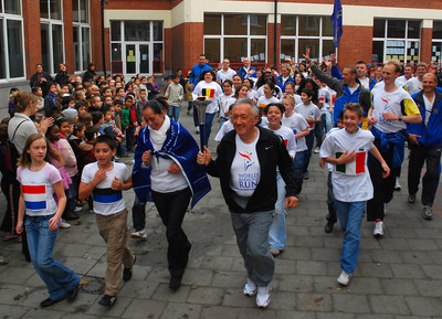 Mr. Kovacs running with school children