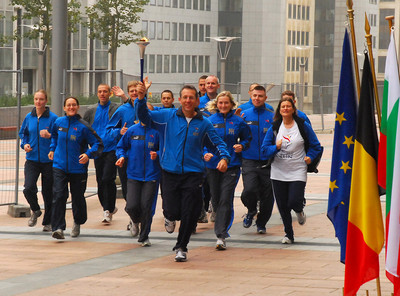 Runners running into the ceremony at the European Parliament