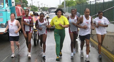 Portia Simpon-Miller, Minister of Sport, Jamaica runs in Kingston
