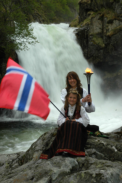 Norwegian girls holding torch