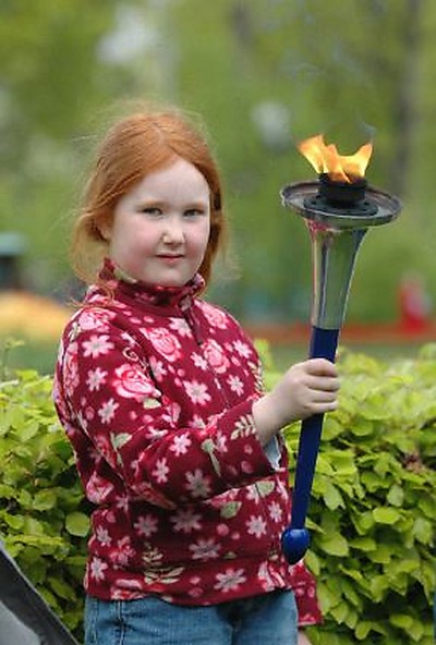 Girl holding torch