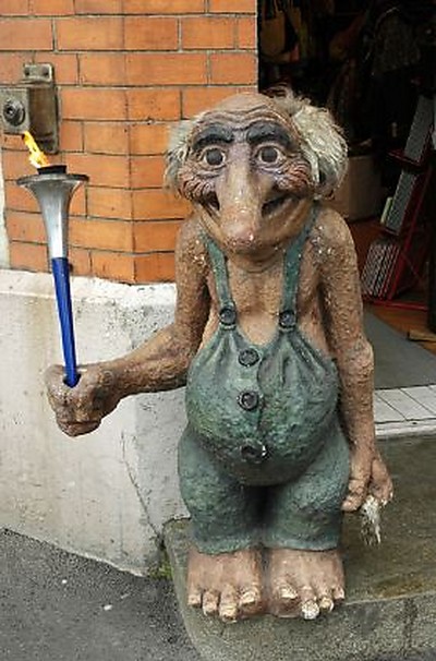 Troll holding torch