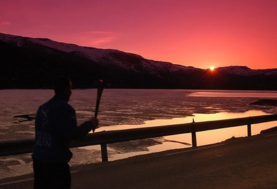 Sunset at frozen lake