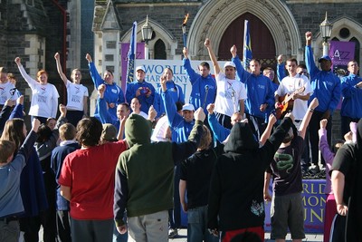 Performing the actions to the World Harmony Run song.