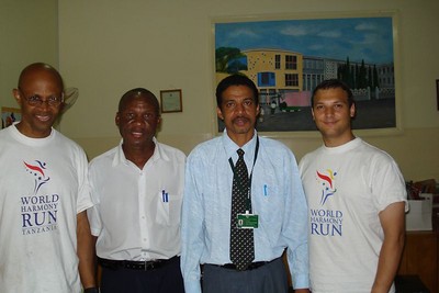 Visiting the Aga Khan School, the Runners with Sports Development Officer Frank Macha and Deputy Head Mr Khalid H. Khalid.