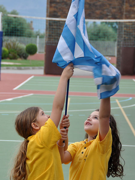 children with the Greek flag