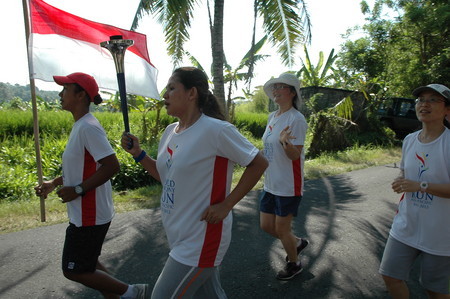 jyoti hold the torch