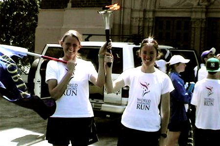 Nishima Knowsley holding torch