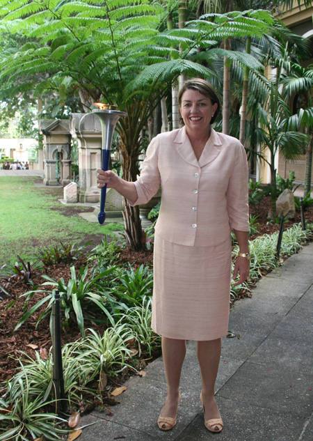 Qld. Premier Anna Bligh holds the World Harmony Run torch, 2008