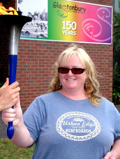 Spectators are keen to hold the torch