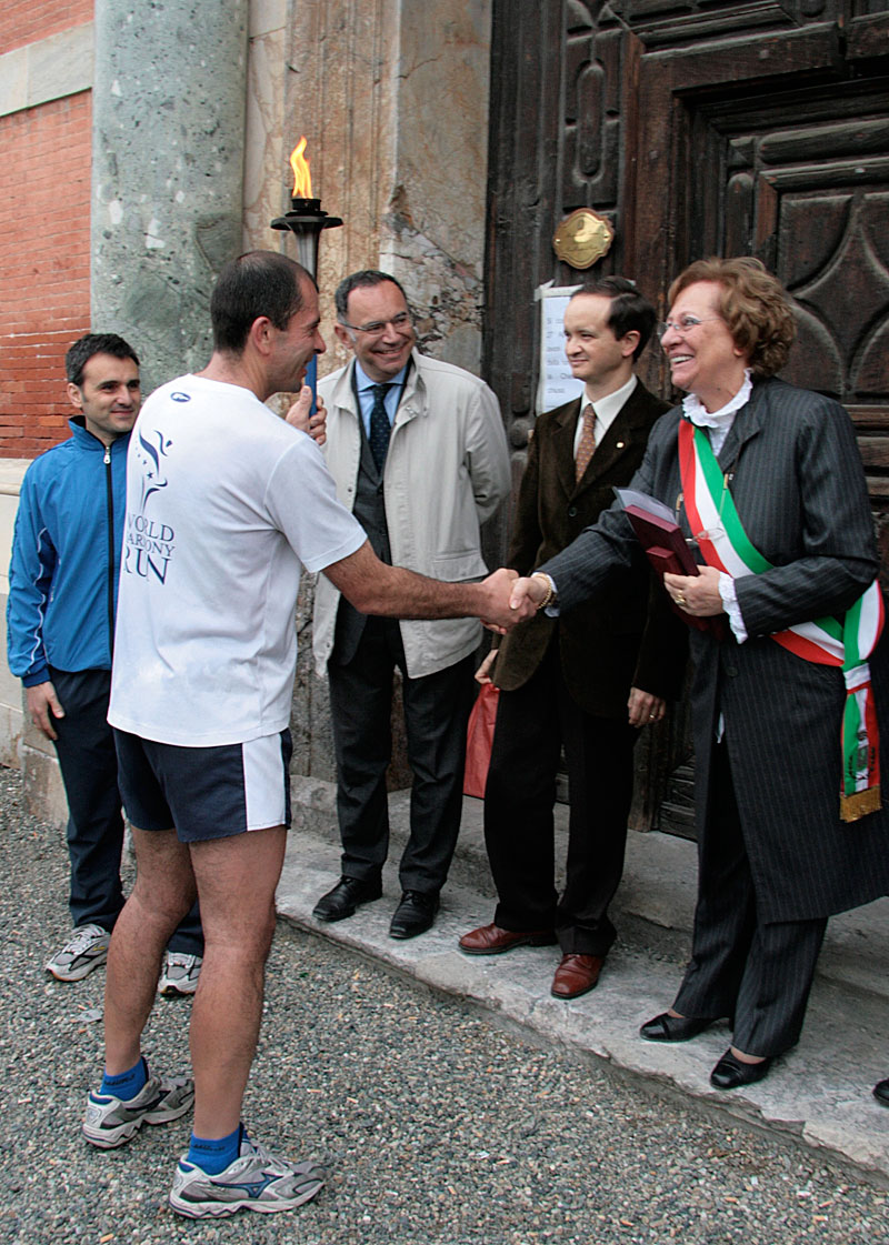 The mayor took the torch...