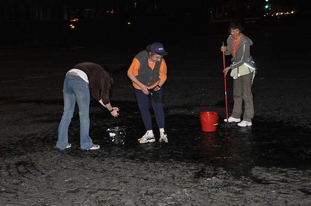 volunteers come out to dry up rain water
