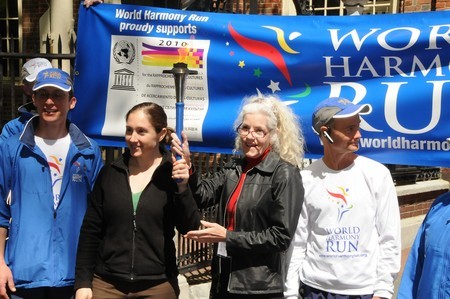 ohil Christ Church assistants hold torch 